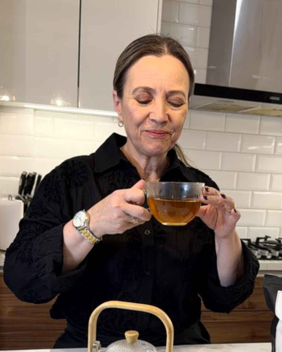 Woman drinking QaraCacao tea